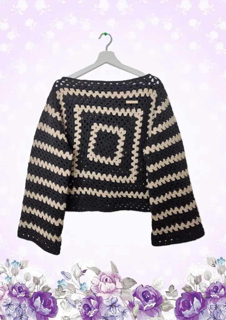 pull noir et beige ceintre fb.webp